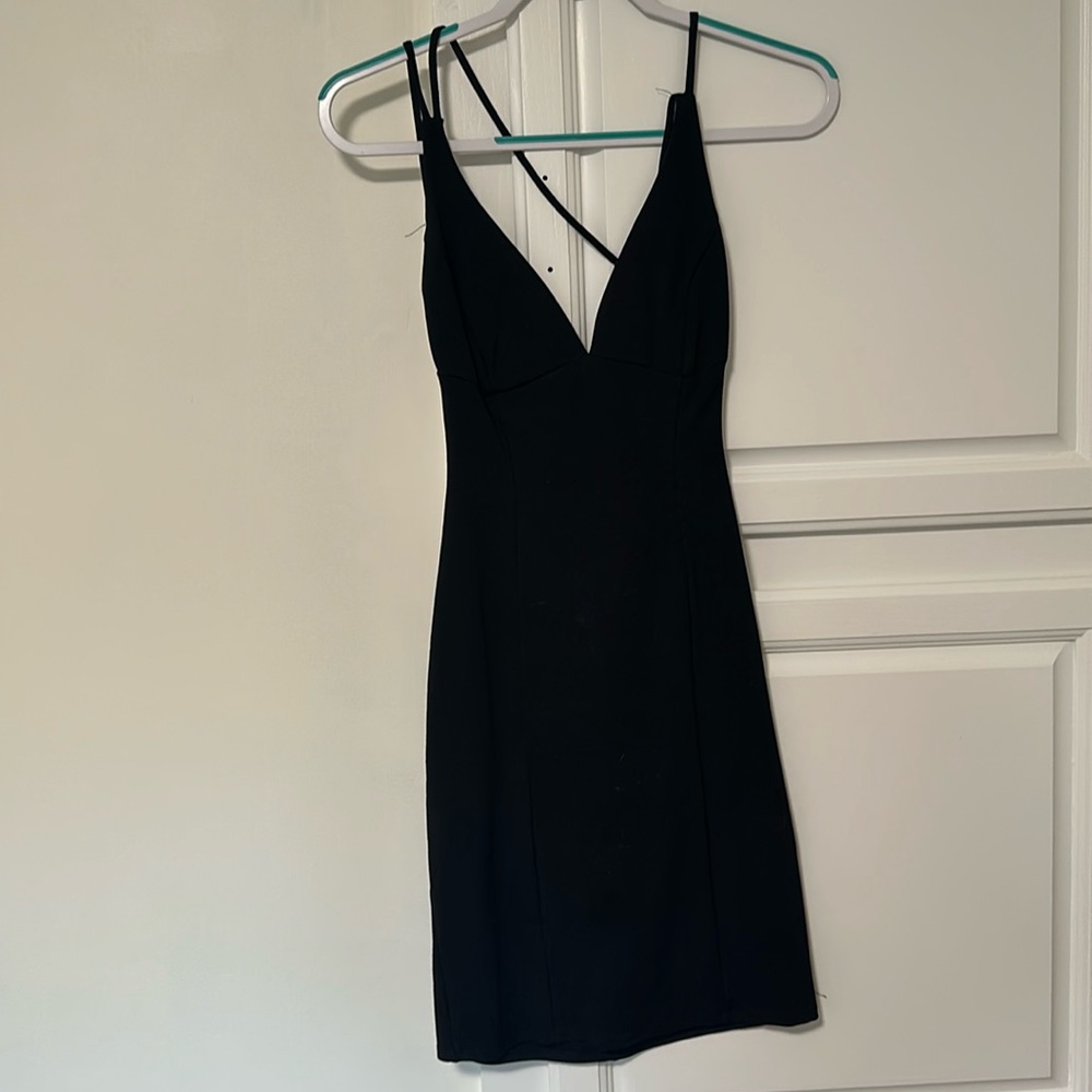 Nice black dress. MIDI. Open back with straps. Size small